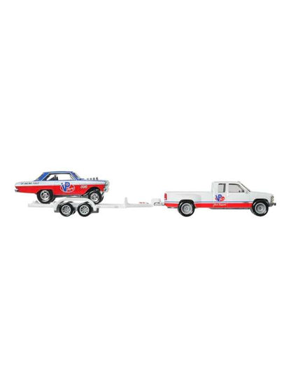 Hotwheels 63 Chevy Nova & 88 Chevy silverado imported team transport 1:64 scale (blister damage car mint condition)